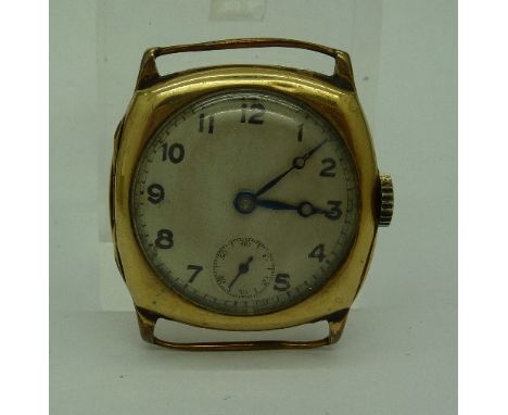 A gentleman's 9ct gold cushion shaped wristwatch head by Tavannes Watch Co.