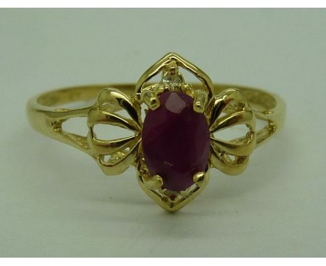 A 9ct gold, ruby and diamond ring, weight 1g, size O