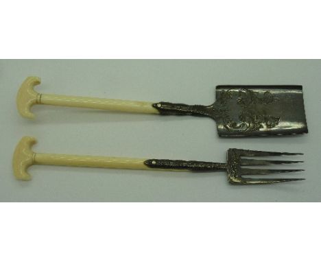 An ivory handled spade and fork, length of spade 16cm