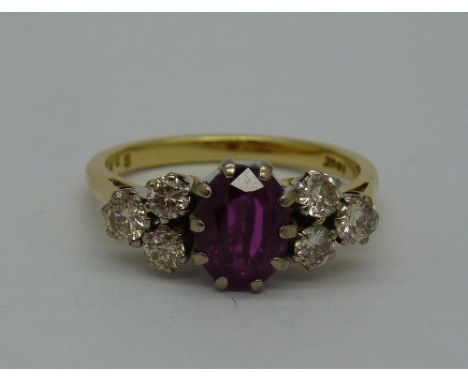 An 18ct gold, ruby and diamond ring, c.1950, weight 4.5g, size N