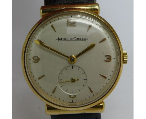 A gentleman's 1950's 9ct gold Jaeger LeCoultre wristwatch with dedication engraved to case back