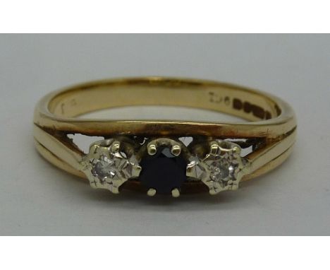 A 9ct gold, three stone sapphire and diamond ring, weight 2.7g, size P