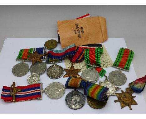 Six WWII medals and a Exemplary Police Service medal to Inspr. Caleb R. Dobie; two WWI medals and a 1900 Solo Singing medal t