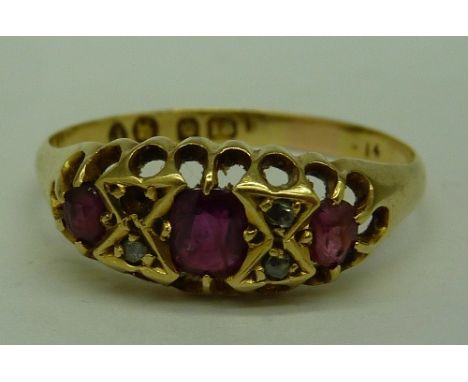 An 18ct gold, diamond and ruby ring, one stone missing, weight 2.3g, size R