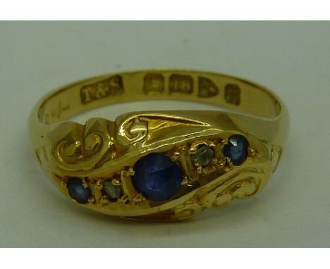 An 18ct gold, sapphire and diamond ring, Chester 1923, weight 2.1g, size K