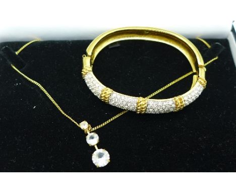 A Swarovski bangle and pendant with chain