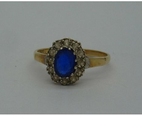 A 9ct gold cluster ring, weight 2.3g, size R