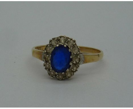 A 9ct gold cluster ring, weight 2.3g, size R