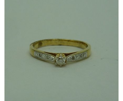 A 9ct gold and diamond ring, weight 1.4g, size K