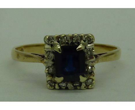 A 9ct gold, diamond and blue stone cluster ring, weight 2.0g, size R