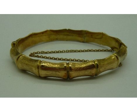 A 9ct gold bamboo style bangle, weight 14.4g