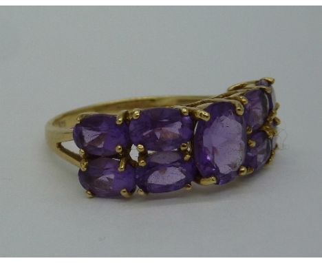 A 9ct gold and amethyst ring, weight 3.1g, size R