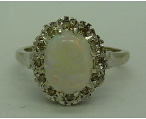 A 9ct white gold, opal and diamond cluster ring, weight 3.3g, size K