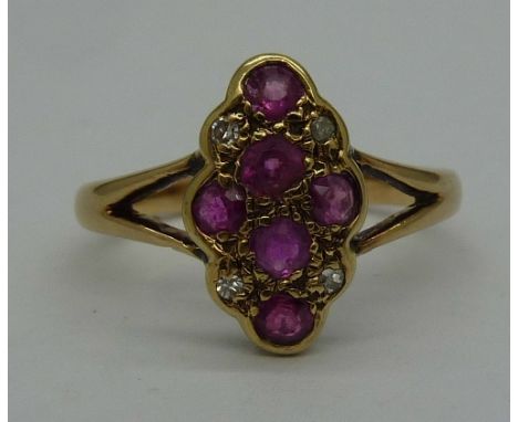 An 18ct gold, ruby and diamond ring, weight 2.4g, size O