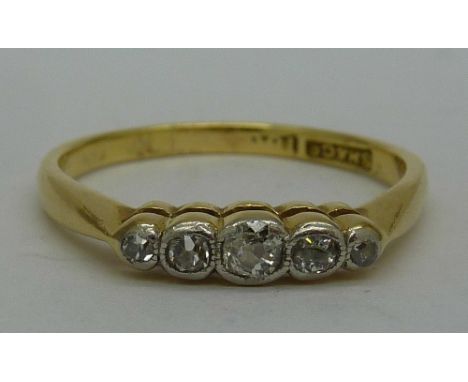 An 18ct gold and five stone diamond ring, weight 2.1g, size L