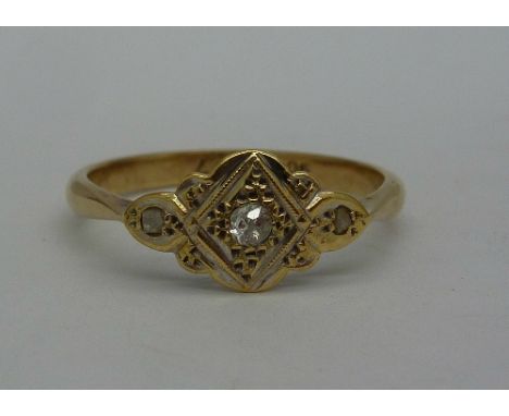 A 9ct gold and three stone diamond ring, weight 1.8g, size M