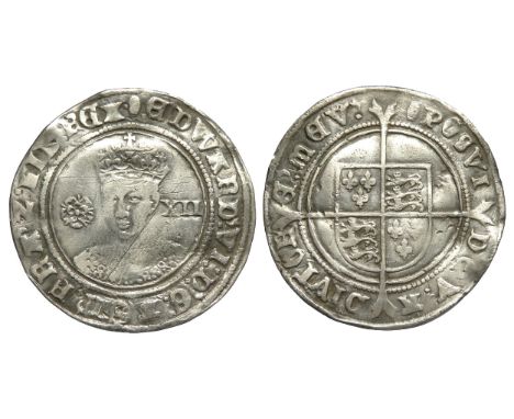 Edward VI shilling. Fine silver issue,Â&nbsp; 1551-53 AD. Crwoned facing bust, rose left; XII mark of value right. R. Shield 