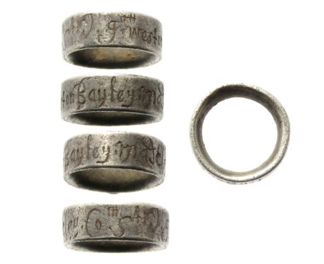 Silver hawking vervel. 10mm x 4mm, 0.90g. A D-sectioned band of silver, the outer edge is inscribed with an italic inscriptio