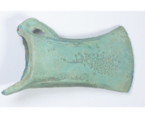 European Bronze Age looped and socketed axe head. Circa 1200-800 BCE. Copper-alloy, 177g. 101mm. A fine example with intact f
