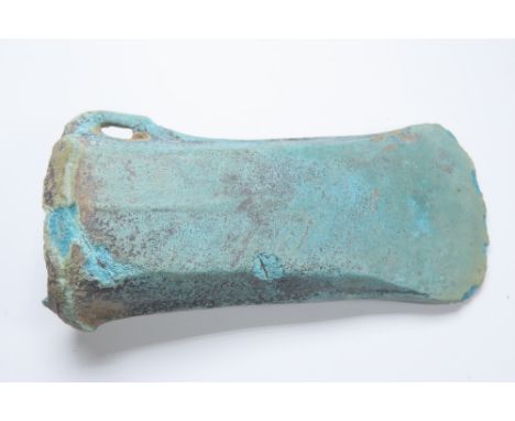 European Bronze Age looped and socketed axe head. Circa 1200-800 BCE. Copper-alloy, 209g. 102mm. A good example with intact f