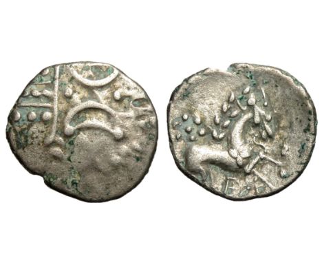Iceni ECEN stepping horse silver unit. Circa 10-43 AD. Back to back crescents over vertical wreath. R. Horse stepping right, 