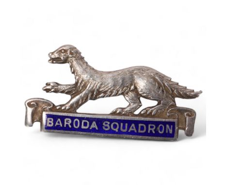 Baroda Squadron, silver and enamel military badge by Fattorini depicting a mongoose, hallmarks Birmingham 1944, length 35mm. 