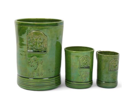 Rye Pottery, 3 graduated green glaze tankards, inscribed model of mermaid tankard Rye 1926, with relief mermaid design panel,