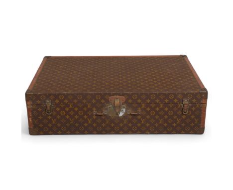 LOUIS VUITTON - hard suitcase/trunk with monogram fabric cover, strapping to corners and brass locks and corner mounts, LV mo