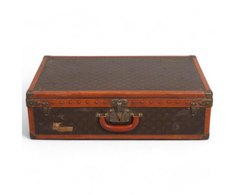 LOUIS VUITTON - a hard suitcase/trunk with monogrammed fabric, edging, brass mounts and locks, label to interior numbered 289