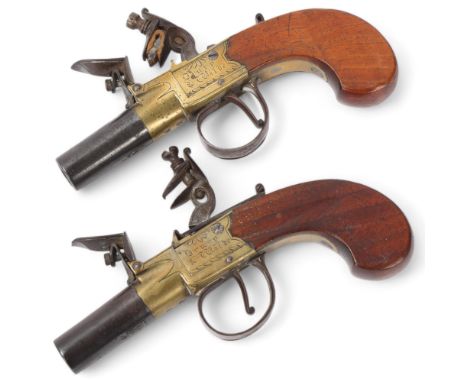 Pair of early 19th century flintlock pocket pistols, by Drury &amp; Wilde, with engraved brass mount and walnut handles, barr