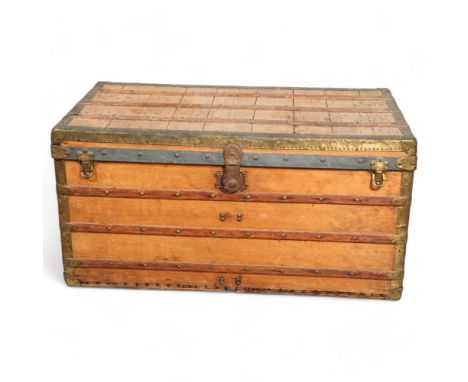 LOUIS VUITTON - a late 19th/early 20th steam trunk with wood and brass mounts, Louis Vuitton marked handles, length 110cm, wi