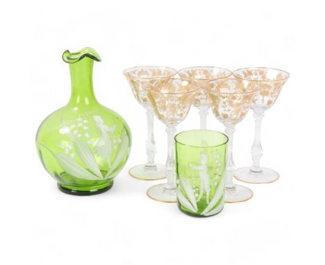 A set of 5 gilded glasses, circa 1900, height 15cm, together with a Mary Gregory green glass carafe and glass (7)