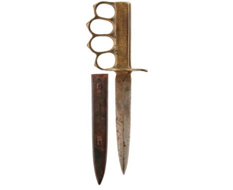 A FIRST WAR PERIOD AMERICAN BRASS TENCH OR FIGHTING KNIFE, 15.5cm flattened diamond section blade, the hilt with later stampe