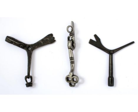 TWO BRUNSWICK RIFLE COMBINATION TOOLS, together with a wheel-lock combination spanner and screw and a toe-lock bearing an ins