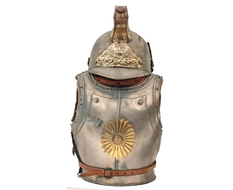 AN EARLY 20TH CENTURY FRENCH CUIRASSIER OUTFIT FOR A CHILD, comprising tin breast and backplate with applied brass decoration