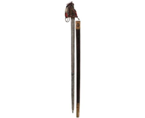 A 1798 PATTERN BASKET HILTED BROAD SWORD, 82.5cm fullered blade, regulation steel hilt composed of flattened rounded bars uni