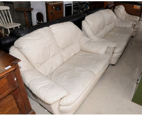 Large two seat cream leather sofa and matching smaller two seat sofa and a matching armchair 