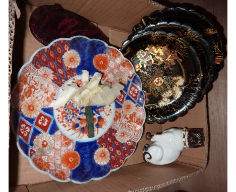 Four oriental paper mache plates, an Imari style plate, an onyx elephant etc