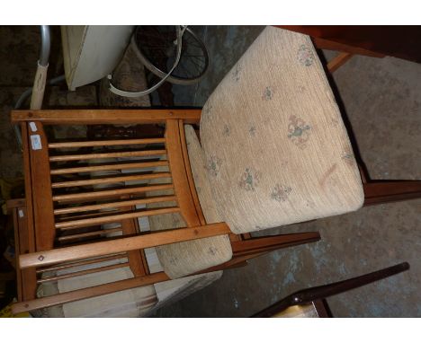 Pair of light oak dining chairs with upholstered seats 