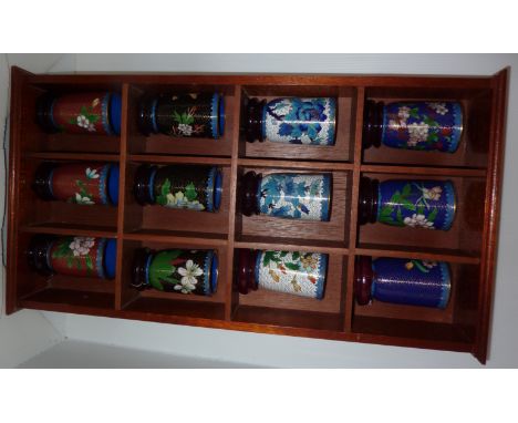 Wall mounted display shelf with twelve modern Cloisonne pots and stands 