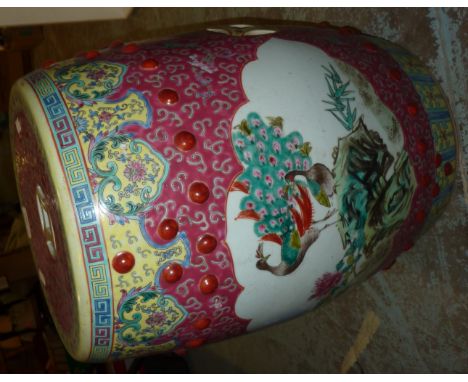 Oriental ceramic garden seat with painted panels depicting exotic birds 