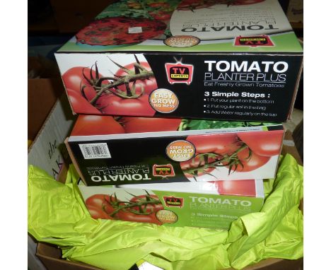 Three Tomato Planter Plus boxes and a selection of high visibility jackets 