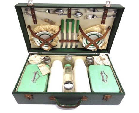A SIRRAM PICNIC SET with settings for four, cased.