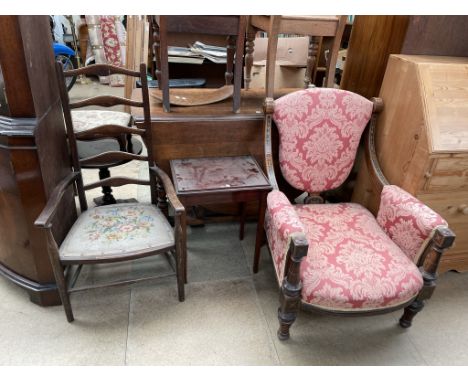 An Edwardian walnut framed library chair, with a pad shield back and seat on square turned legs together with a mahogany tabl