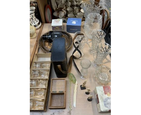A Super 8 camera together with glass vases, carved bone figures, a wooden plate, etc 