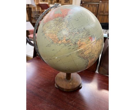 A Philips' Challenge Globe, Scale 1:37,500,000, on a turned wooden stand, 45cm high