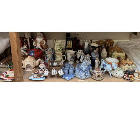 A cottageware biscuit barrel together with a cottageware butter dish and cover, Nao figure, Christmas pottery, Mining memorab