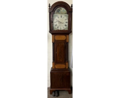 A 19th century mahogany longcase clock, the arched hood with barley twist columns and a short trunk door, box base and bracke