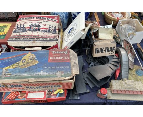 A Tri-ang Electric Pylon Helicopter together with other games, model yacht etc 
