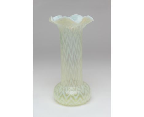 Edwardian vaseline glass specimen vase, circa 1910, frilled cylinder form with a bulbous base, decorated internally with chev